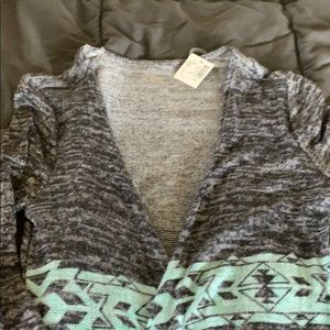 Girls justice throw over light jacket